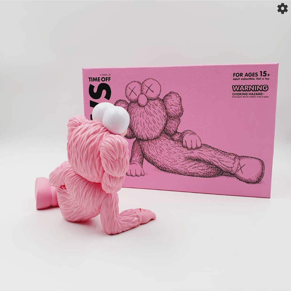 https://thefactoryconceptstore.com/wp-content/uploads/2023/06/KAWS-TIME-OFF-PINK-2023-Side-View.jpg